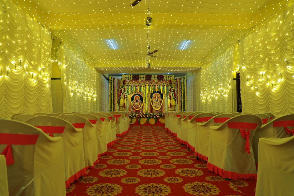 Luxurious event hall with elegant lighting and stage setup